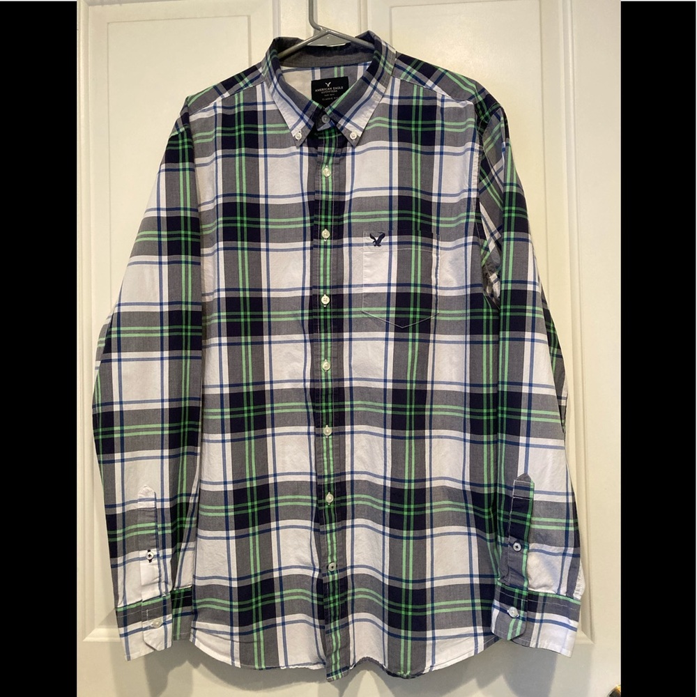 Long sleeve plaid button down shirt.